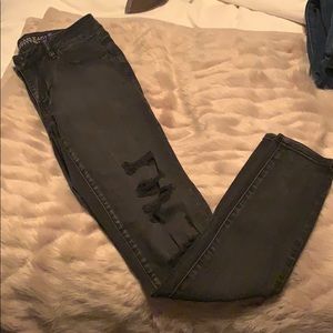Black American eagle skinny jeans with holes